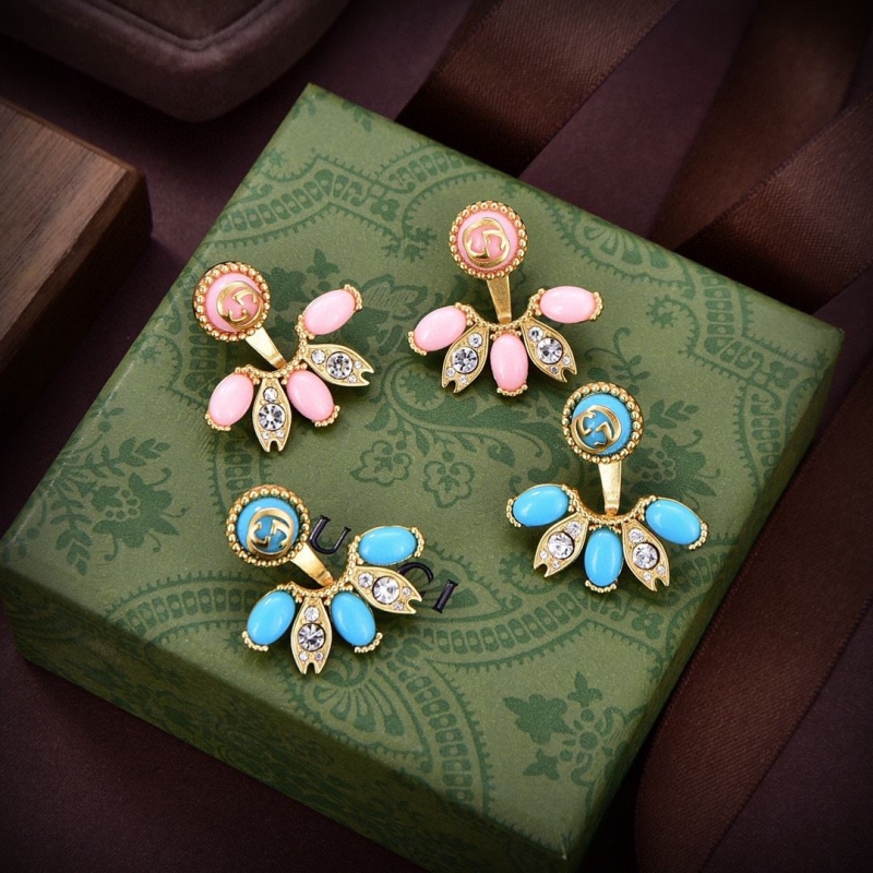 G*u*i earrings